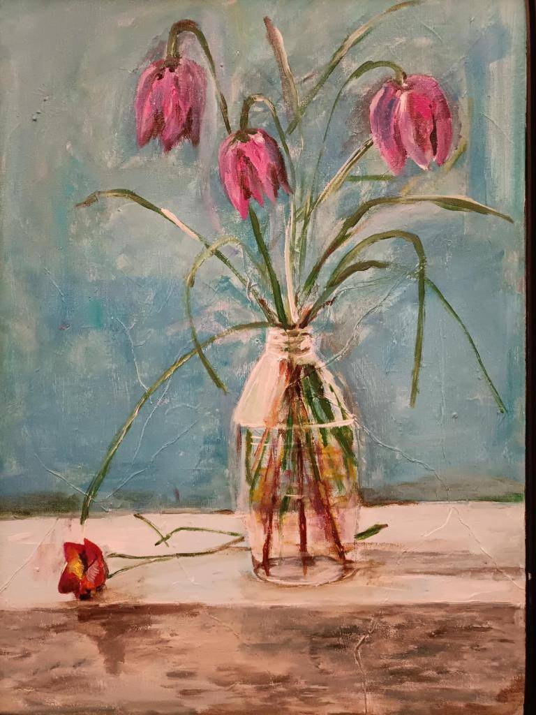 Pink tulips in transparant vase image