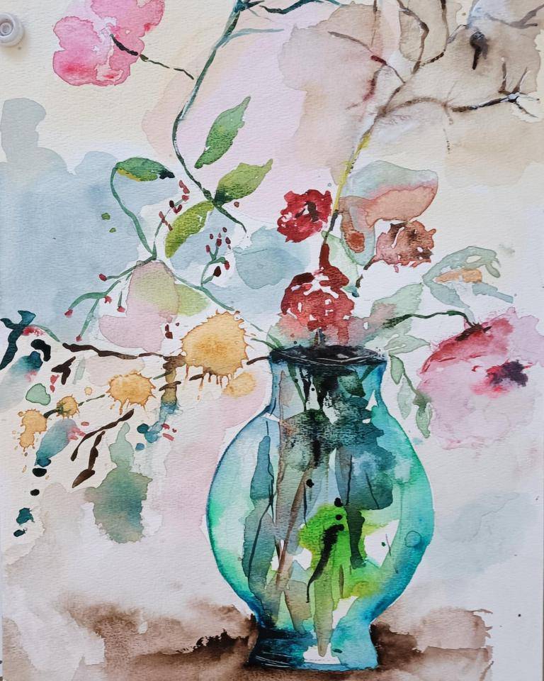 Transparent vase with fragile flowers image