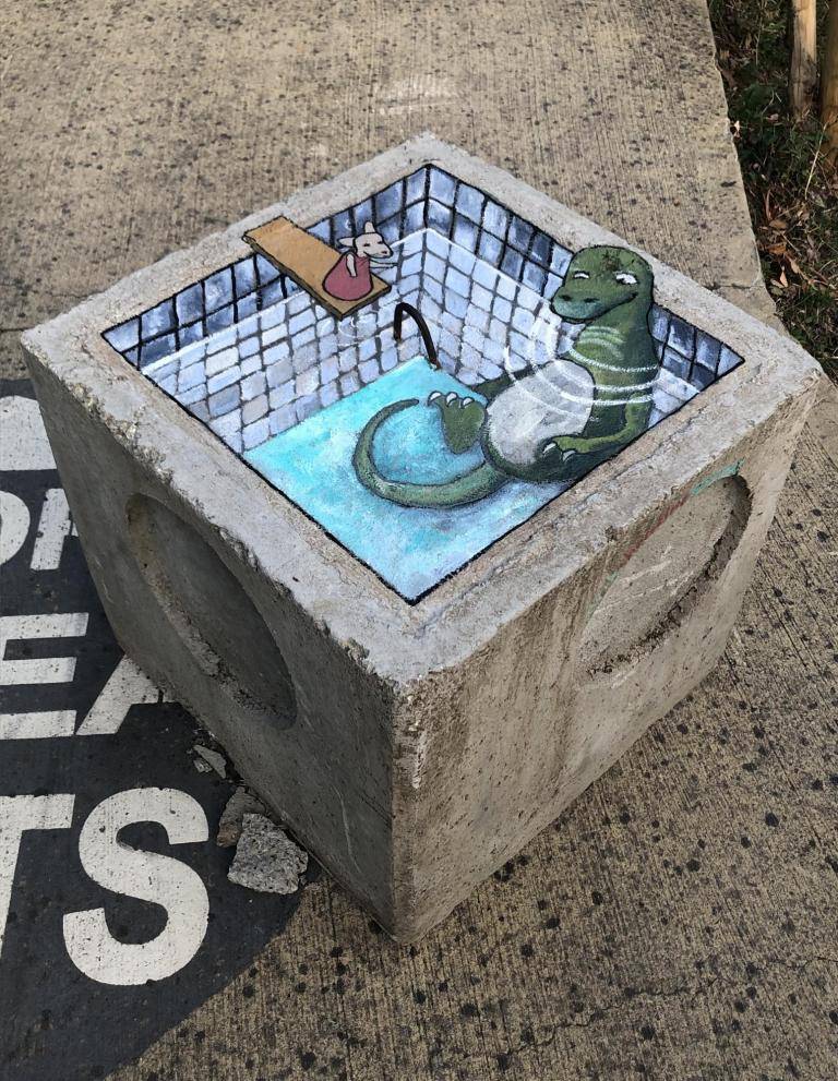 3D optical illusion on top concrete block image